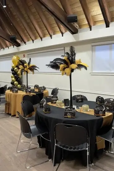 60th birthday party with black and gold decorations