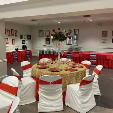 Red and gold themed wedding reception held at the Vacaville Veterans Hall